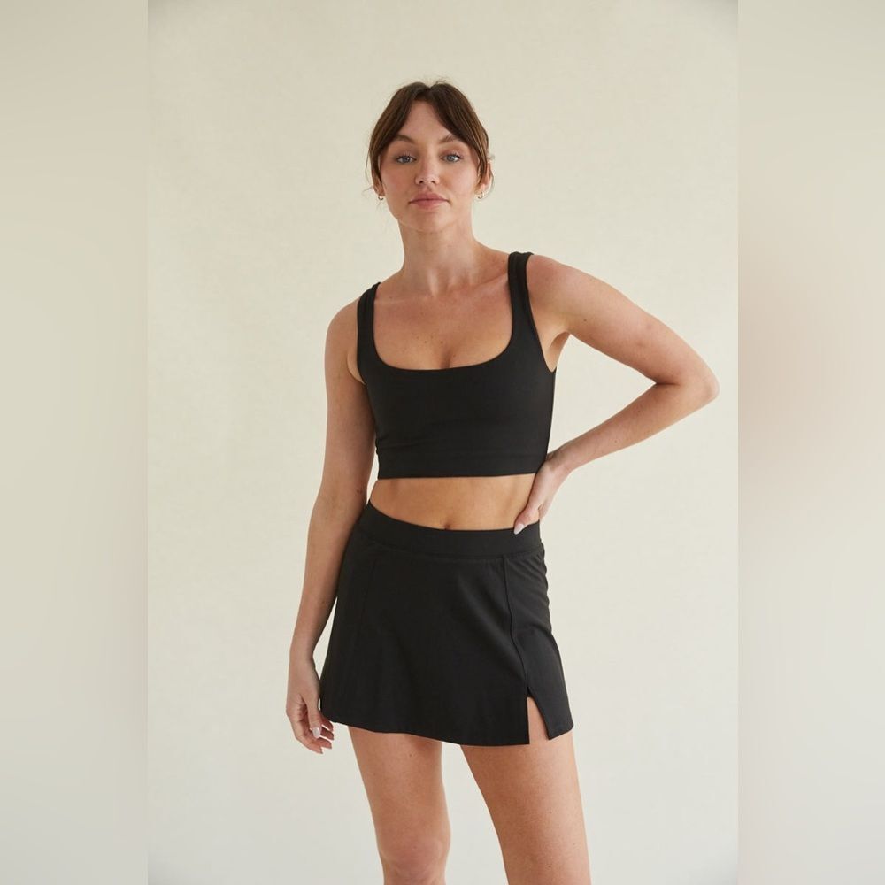 YPB Nina Smoothing Tennis Skort in Black XS NWT in packaging